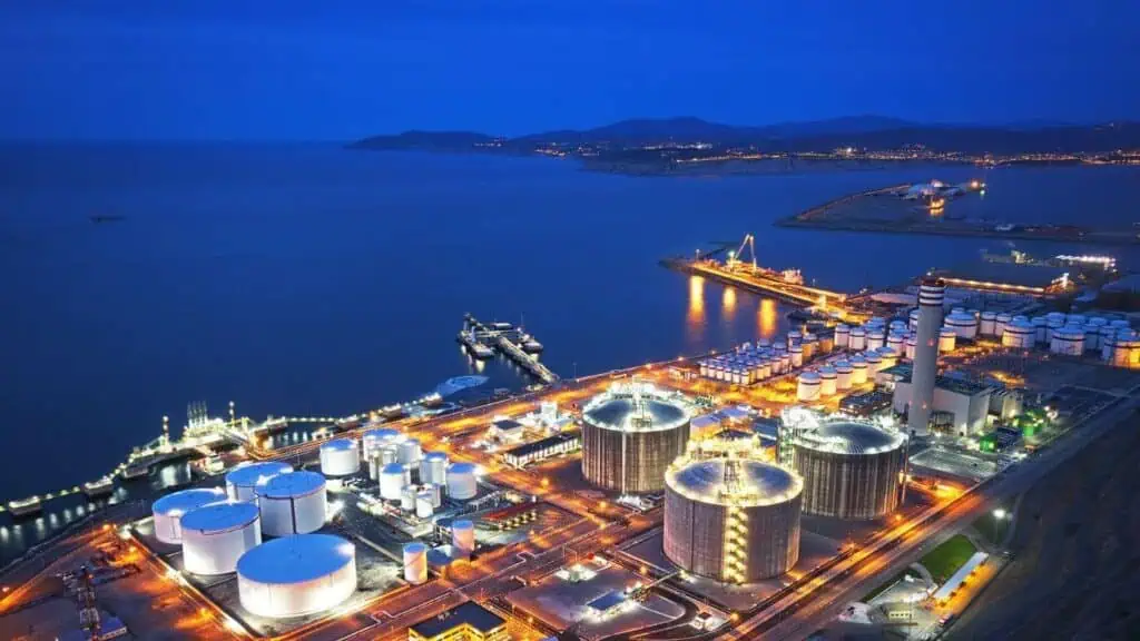 Illuminated industrial port at night