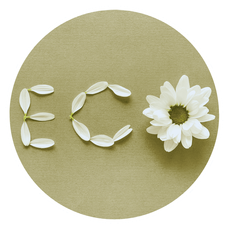 Eco written with white petals and flower